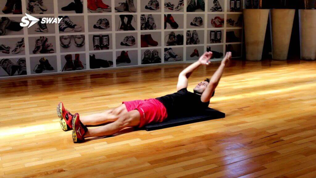 Exercício para o abdômen no colchonete